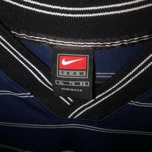 Vintage Nike Blue/White Striped T-Shirt .